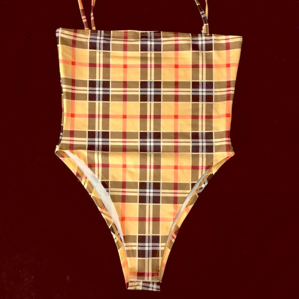 Alien outfitters yellow plaid body suit.